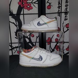 Nike Dunk Low White Sneakers with Artistic Swoosh